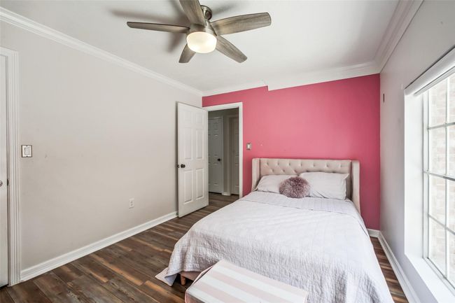 Secondary bedroom #1 located on the second floor. Spacious closet and steps away from the full bathroom and gameroom. | Image 23