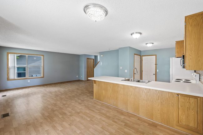 1011 6 Th Ave Ne, Townhouse with 3 bedrooms, 4 bathrooms and null parking in Buffalo MN | Image 4