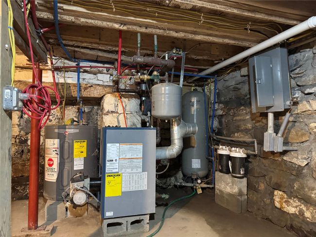 Utilities with water heater and electric panel | Image 19