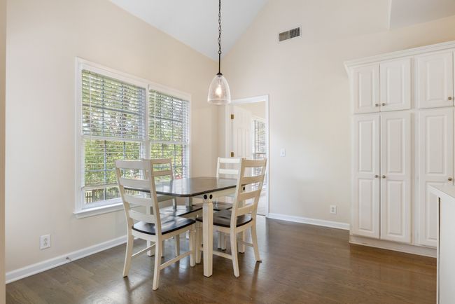 Kitchen has eat-in area for casual dining | Image 10