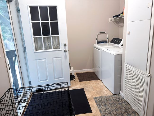 Laundry room with baseboards, visible vents, laundry area, and separate washer and dryer | Image 24