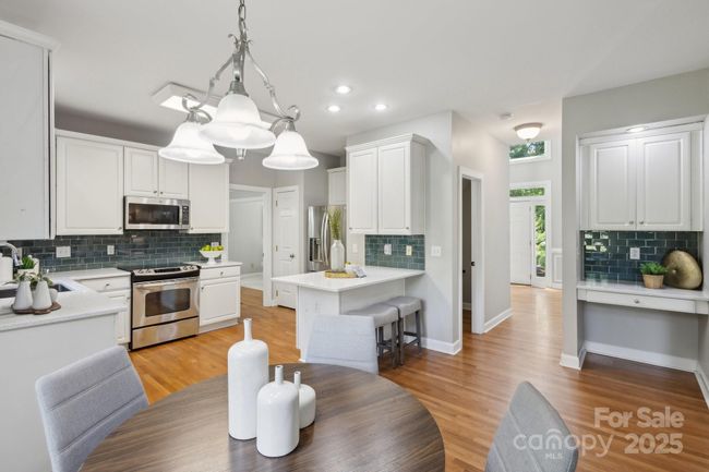 Kitchen with dining area | Image 10