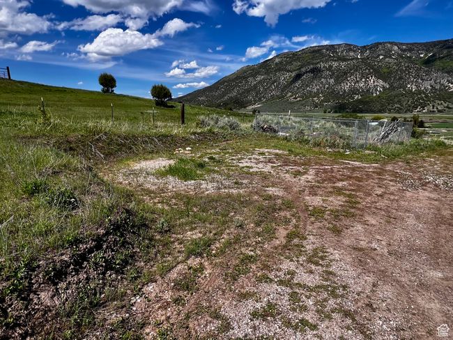 View of mountain backdrop featuring rural landscape | Image 21