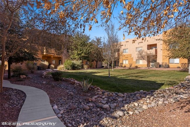 View of home's community featuring a lawn | Image 46