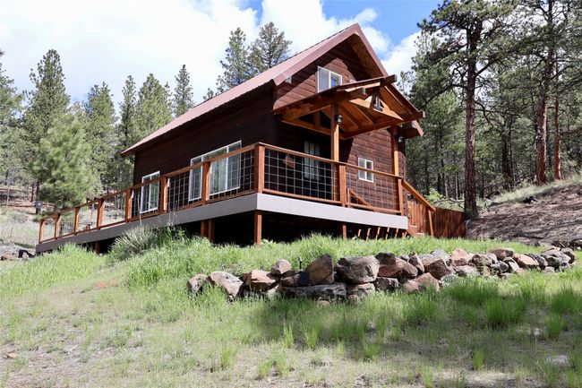 View of home's exterior with a deck | Image 33