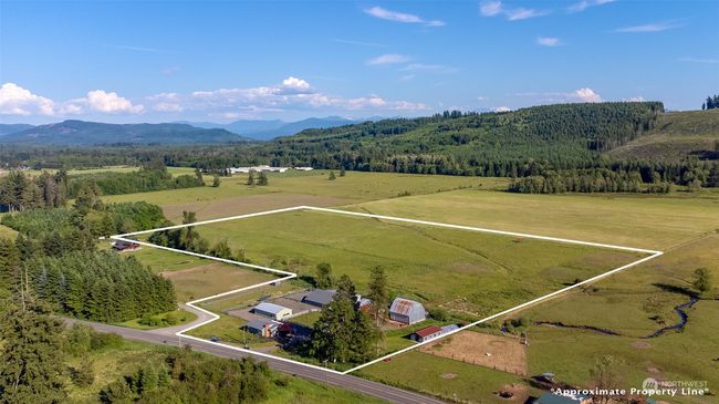 This versatile farm offers endless potential, whether you're envisioning a roadside farm stand, an event center, or another farm / acreage based business. Its prime location is conveniently accessible for travelers heading east and just a short drive from I-5, making it an ideal spot for various ventures. Be sure to ask your broker for the extensive list of additional features this property offers—it's a long one, and each detail adds to the value and possibilities of this remarkable farm | Image 4