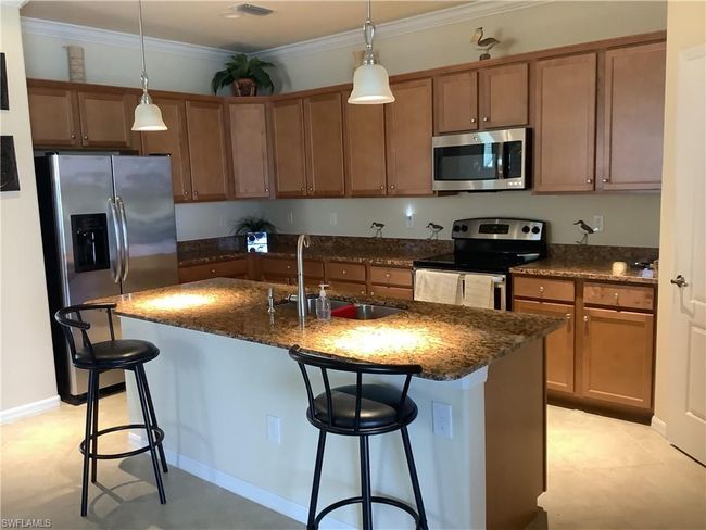 11422 Icarus Cir, House other with 4 bedrooms, 3 bathrooms and 2 parking in LEHIGH ACRES FL | Image 4