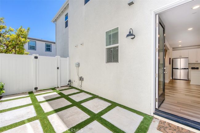 Beautifully landscaped patio. | Image 28
