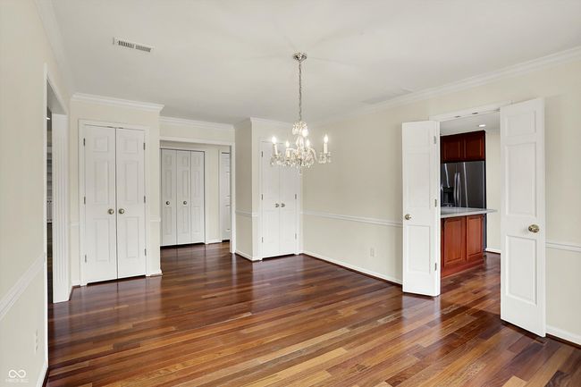 Dining room leads to the kitchen | Image 12