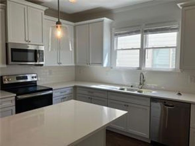 5099 Noble Village Way, Townhouse with 2 bedrooms, 2 bathrooms and null parking in Lilburn GA | Image 9