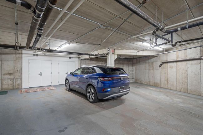 Three private heated parking stalls and storage in the garage | Image 53
