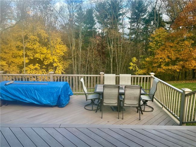 two tiered deck with a peaceful wooded view | Image 17