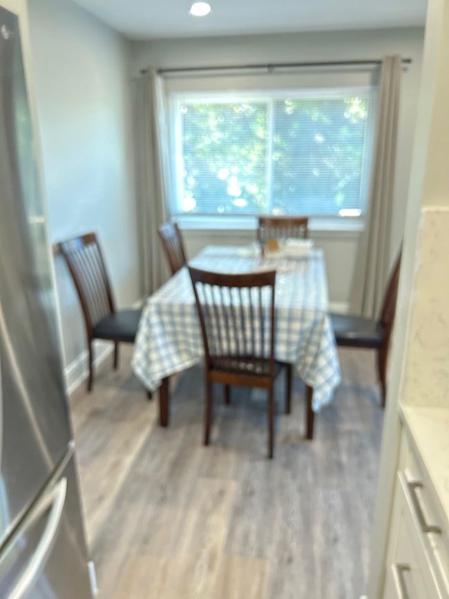 Dining space featuring plenty of natural light, light wood finished floors, baseboards, and recessed lighting | Image 15