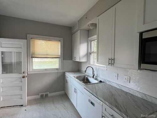 1-2254 Biddle Ave, Wyandotte, MI, 48192-4649 | Card Image