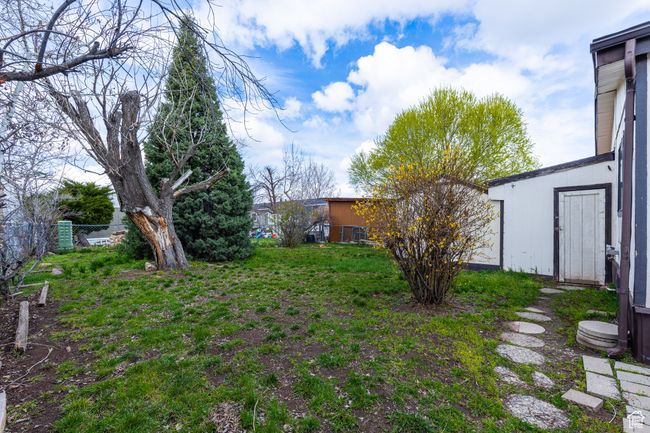 View of yard featuring fence | Image 18