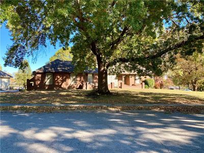 View of front of home featuring a front lawn | Image 1