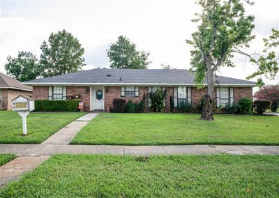 Single story home with a front lawn | Image 1