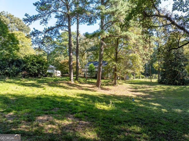 724 Cowan Rd Se, House other with 5 bedrooms, 4 bathrooms and 3 parking in Conyers GA | Image 15