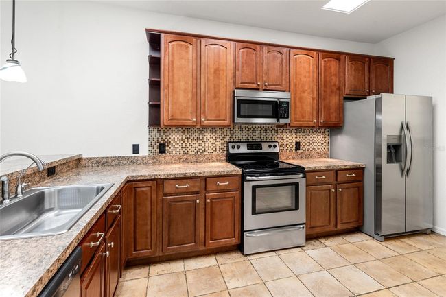 104 - 1936 Heron Cove Dr, Condo with 2 bedrooms, 2 bathrooms and null parking in Lutz FL | Image 6