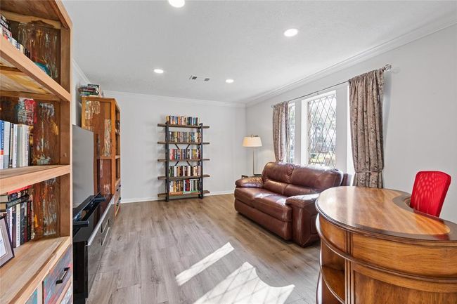 Formal living or office has crown molding and wood engineered wood floors. Nice and bright! | Image 9