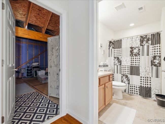 One of two walk in attics | Image 35
