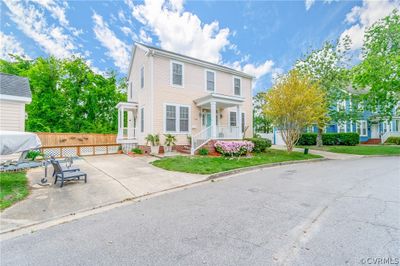 Colonial-style house featuring covered porch | Image 2