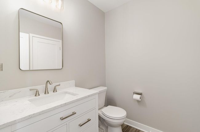 Main Level 1/2 Bath includes a large closet that can be converted to additional pantry space. | Image 7