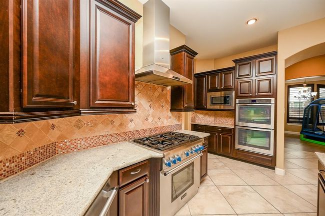 Kitchen with 3 Ovens | Image 11
