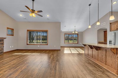 Open Concept Living Space with Vaulted Ceilings and Lots of Natural Light and Ceiling Fans | Image 3