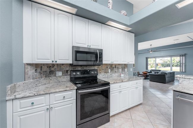 15674 Applewhite Cir, House other with 3 bedrooms, 3 bathrooms and null parking in Port Charlotte FL | Image 24