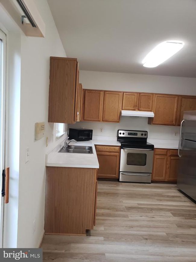 9426 Silver Meteor Ct, Townhouse with 3 bedrooms, 4 bathrooms and null parking in MANASSAS PARK VA | Image 11