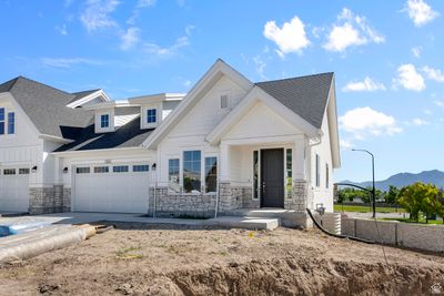 View of front facade featuring a garage | Image 2