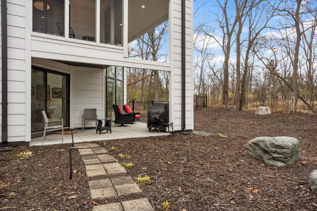 See upper level master screen porch with main level covered patio | Image 31