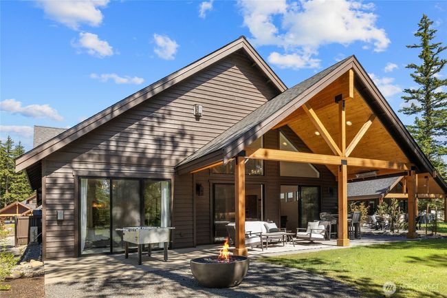 This beautiful covered back patio adds 313 additional square footage with gas firepit. | Image 20