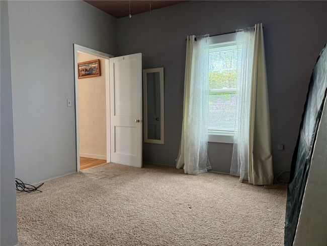 Primary bedroom, main floor | Image 22