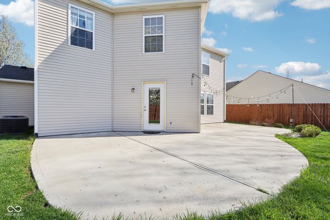 back of house with a patio area and central AC unit | Image 62