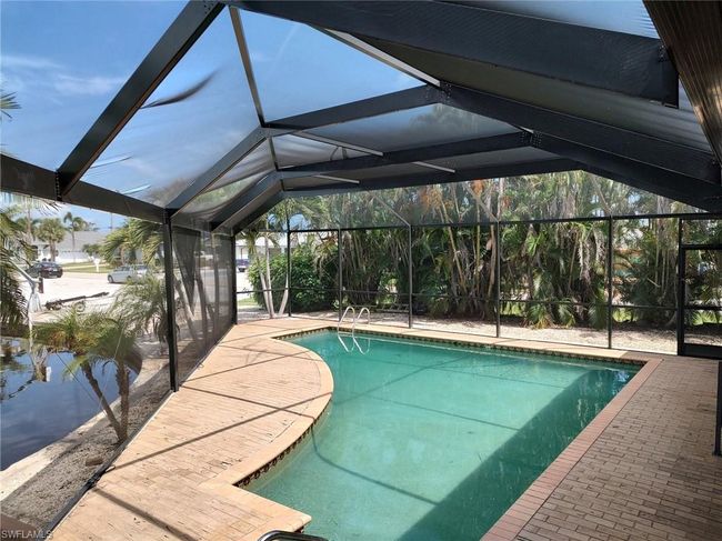 12321 Moon Shell Dr, House other with 3 bedrooms, 3 bathrooms and 2 parking in MATLACHA ISLES FL | Image 14