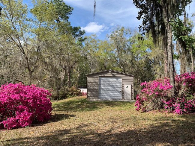 24645 Ne 177 Th Ter, House other with 2 bedrooms, 1 bathrooms and null parking in Fort Mc Coy FL | Image 18