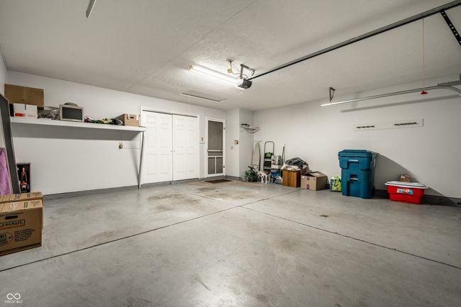 2 car garage featuring a garage door opener | Image 20