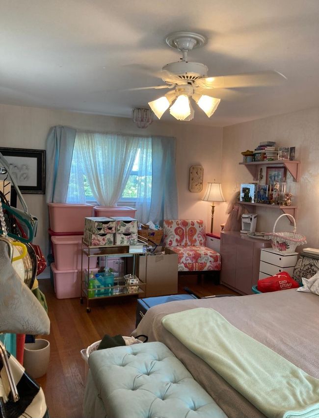 Bedroom with wood finished floors | Image 42
