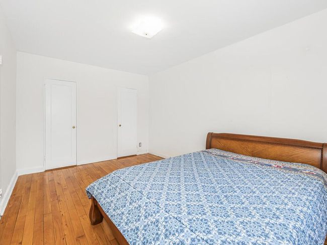 Bedroom featuring hardwood / wood-style flooring | Image 7