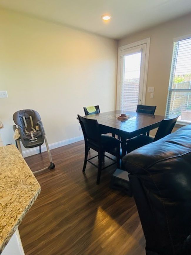 Dining area featuring dark wood-style floors and recessed lighting | Image 12