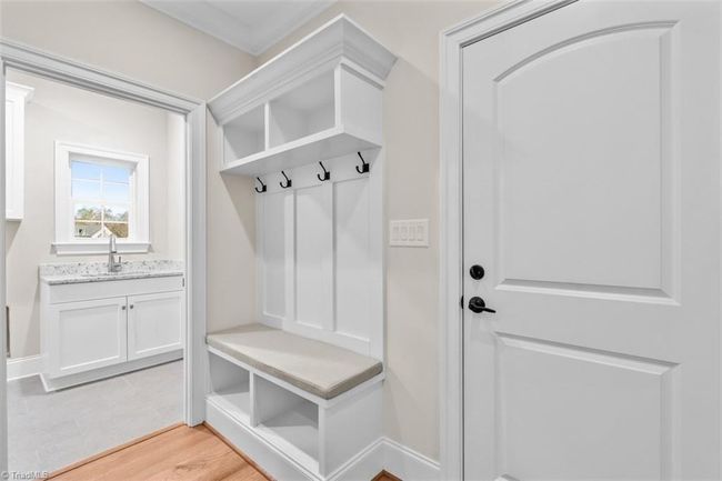 Drop zone. View of laundry and door to garage. | Image 19