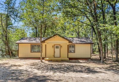 Ranch-style home with covered porch | Image 1