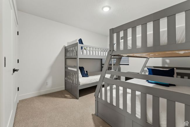Bedroom with light carpet | Image 40