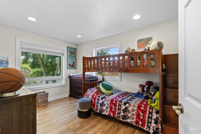Bedroom featuring wood finished floors and recessed lighting, walk in closet | Image 17
