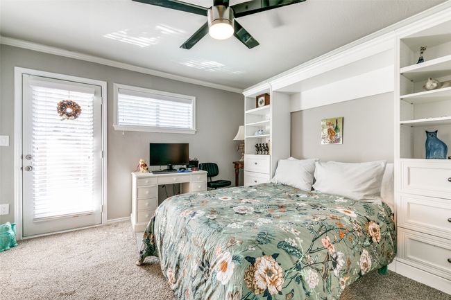Third secondary bedroom has an ensuite bathroom and the door provides access to the pool area. | Image 18