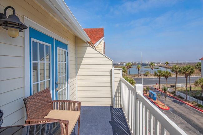 Across the street from the condo is Lake Padre and Gulf waters a block away. | Image 24