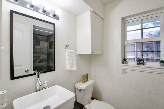 Half bath with a sink and toilet | Image 29