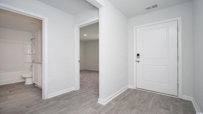 Entryway with light wood-type flooring | Image 3